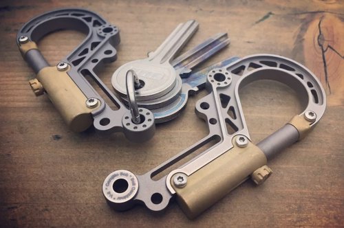 Skeletonized Bolt carabiner made from titanium and brass is a trendy way to carry your keys