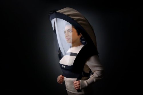 This air purifying face-shield creates a bubble of safety around its wearer