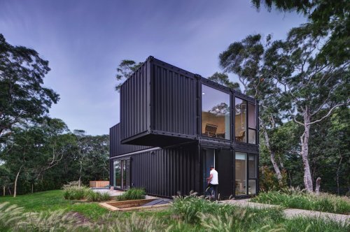 This prefab home constructed from six modules features one floating shipping container