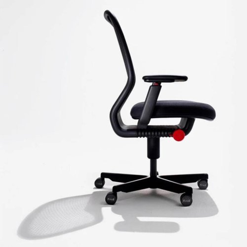 Marc Newson’s Task chair brings a “floating” seat, perforated back design