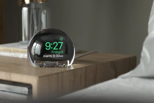 This Apple Watch dock comes with a massive magnifying-glass, turning the watch screen into a time-telling crystal orb