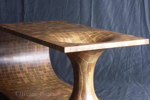This mind-blowing coffee table was painstakingly handmade with dozens of wooden strips