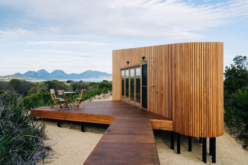 This tiny timber home was inspired by a slide viewer to give guests the best views of Tasmania’s coastline