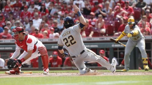Brewers slug early, hold on to defeat Reds
