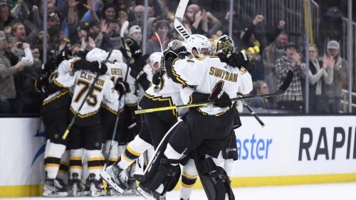 NHL roundup: Bruins make history with OT win