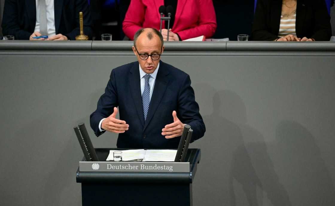 Germany's Merz urges MPs to back spending bonanza in fiery debate
