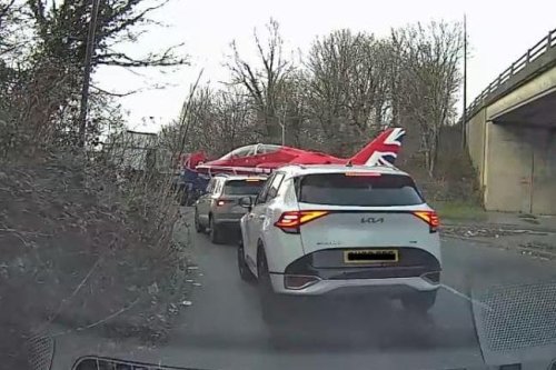 Dashcam footage shows Red Arrows jet going round UK roundabout