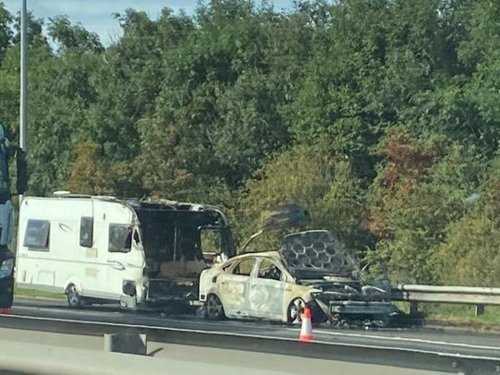 Shocking photos show damage to car and carvan after fire which closed M62