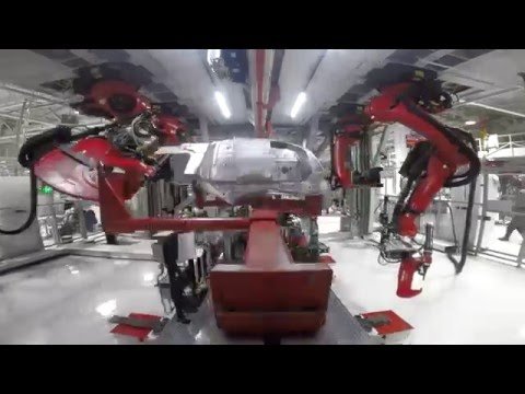 Tesla receives massive shipment of robots for Model 3 production line - first pictures